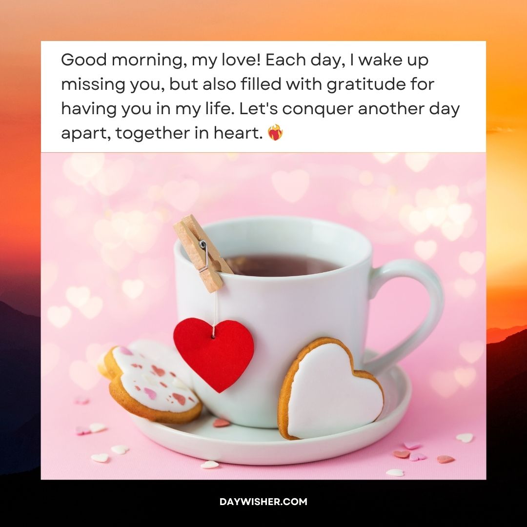 A cup of coffee with heart-shaped cookies, a red heart clipped to the cup, set against a pink background with scattered hearts. The text conveys a loving good morning message for her long distance.