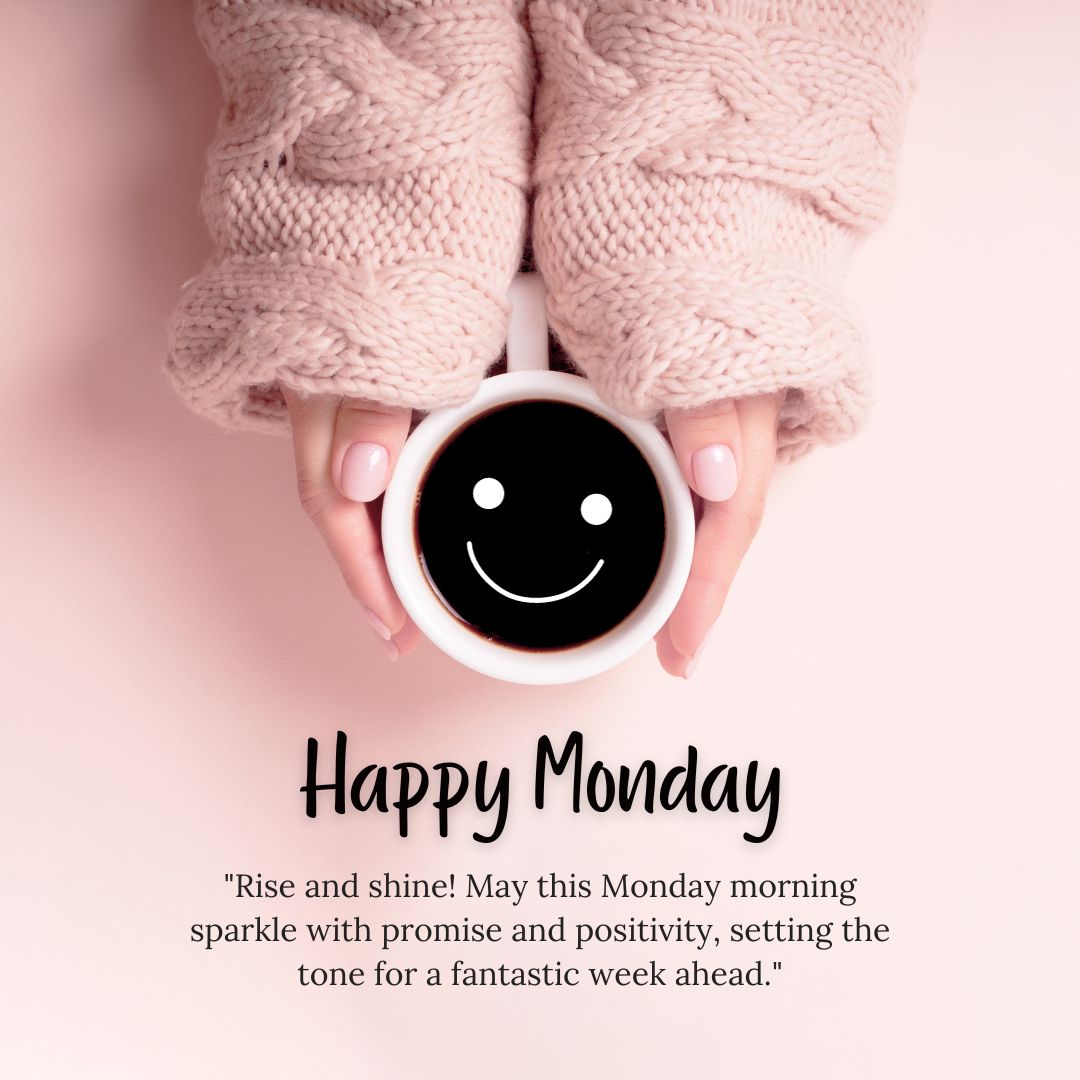 Hands in a cozy knitted pink sweater holding a coffee mug with a smiley face on a pink background, bearing the message "Monday Morning Wishes" and an inspirational quote.