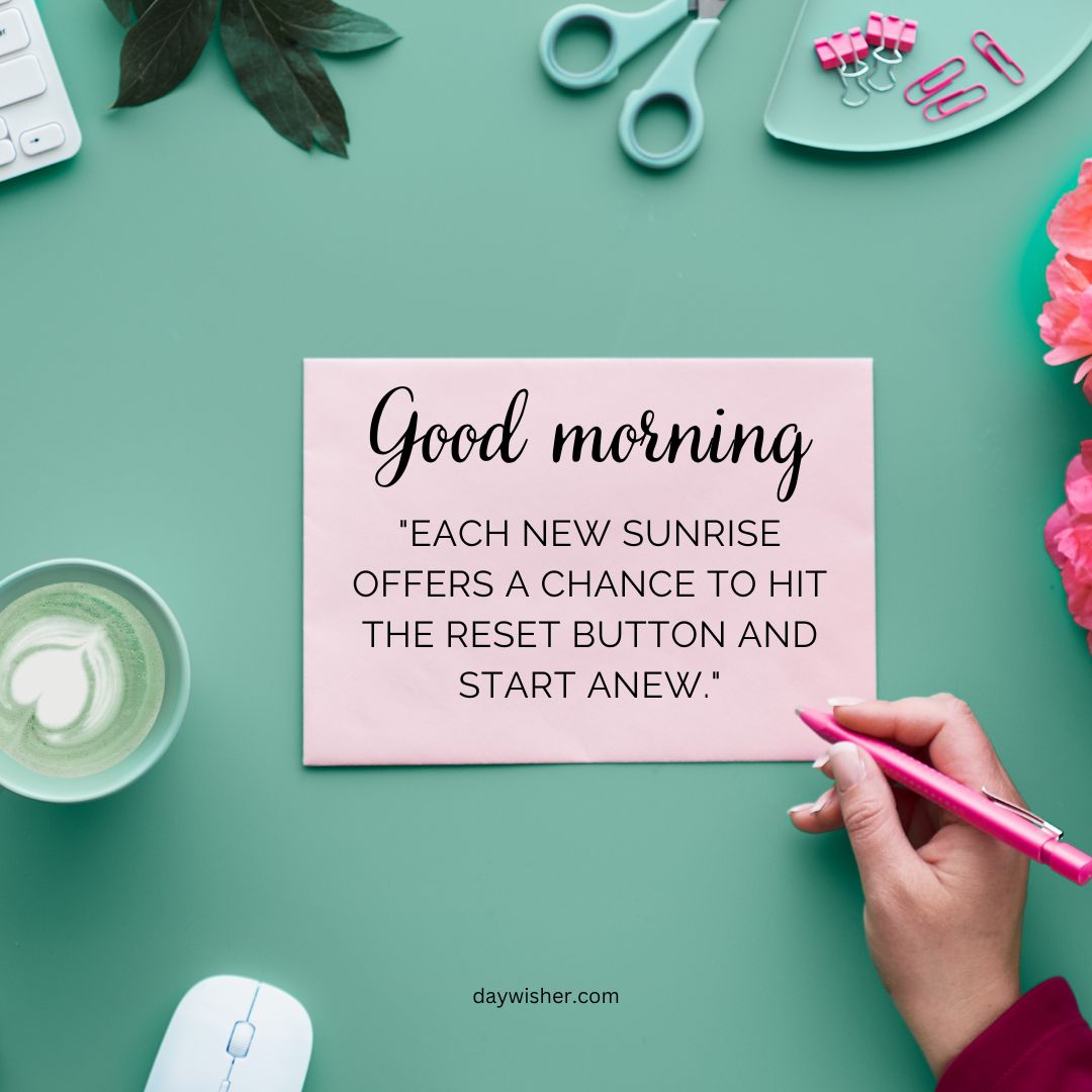 A person's hand writing a motivational quote on a pink sticky note that reads "Good Morning Images with Quotes" on a teal background with flowers and a coffee cup.