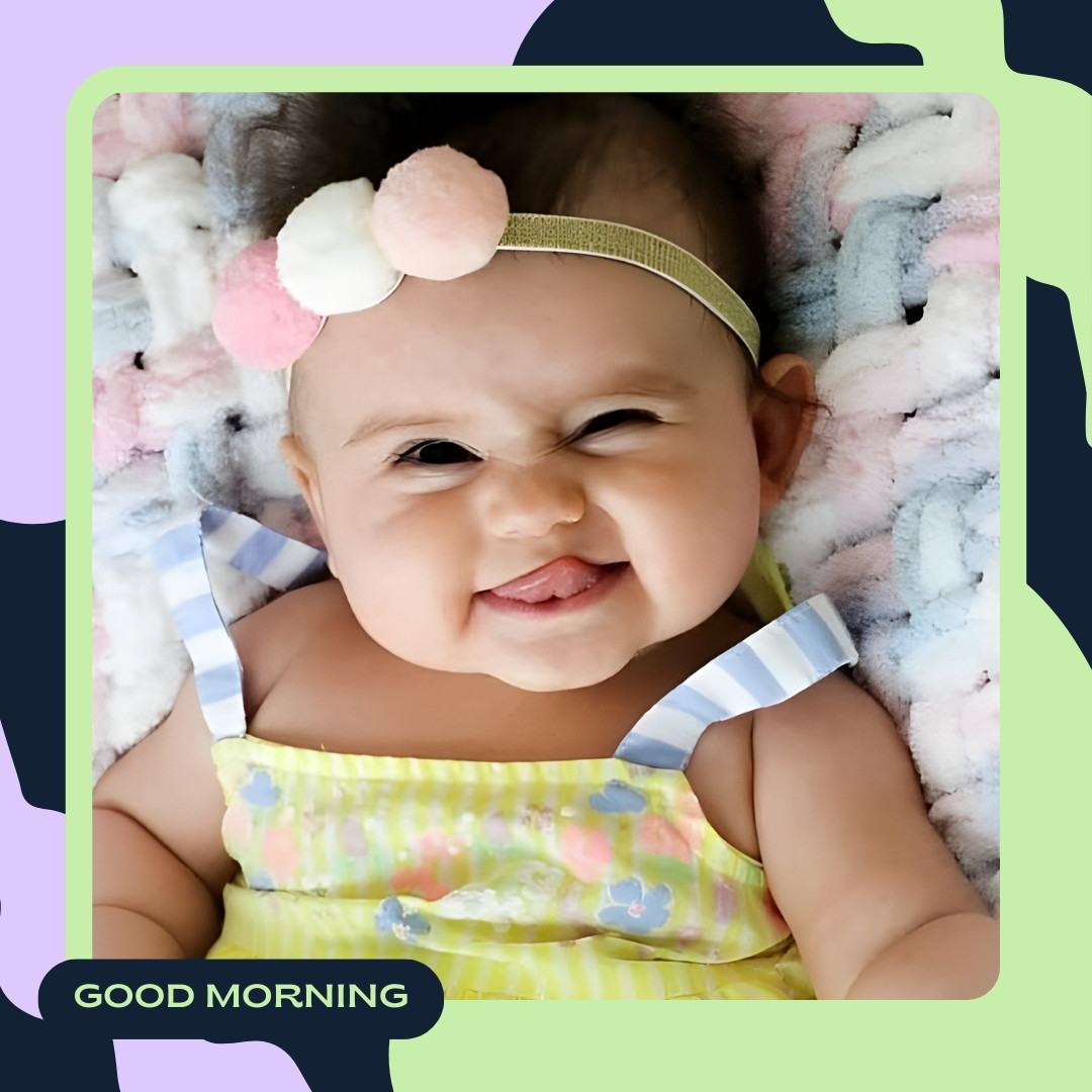 Baby girl with a joyful squint and a big grin, wearing a yellow floral dress and a colorful pom-pom headband, lying on a multicolored blanket, perfect for a lively good morning baby greeting.