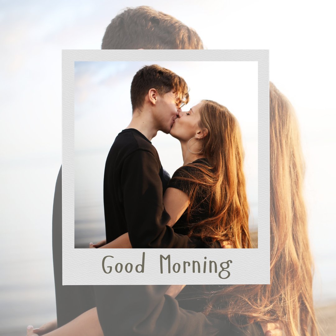 A romantic photo of a couple sharing a kiss on the beach at sunrise, framed in a polaroid style with the text "Good Morning" at the bottom. The serene background and affectionate embrace make this image perfect for a loving morning greeting.