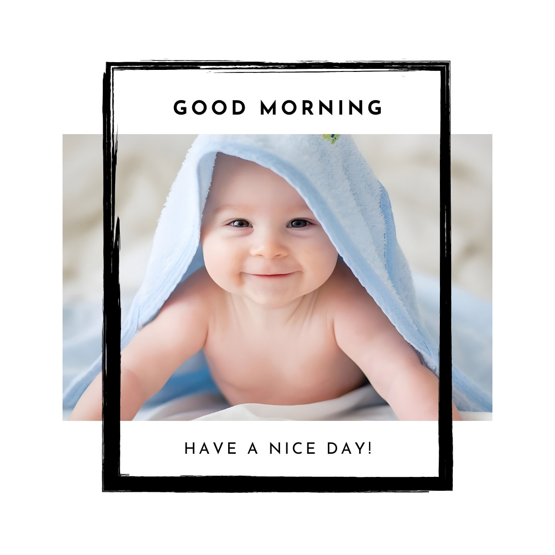 Adorable baby smiling warmly under a soft blue towel, framed in a black and white Polaroid-style border with 'Good Morning' and 'Have a Nice Day!' messages enhancing the cheerful and loving mood of the picture. The baby's bright eyes and joyful expression create a heartwarming morning greeting.