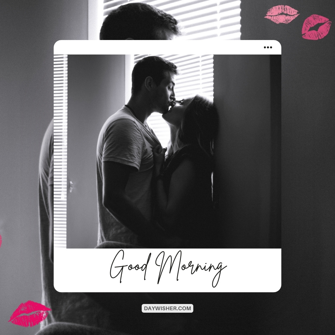 A black and white image of a couple sharing a passionate kiss by the window, with the words "Good Morning" in elegant script at the bottom. Pink lip prints adorn the corners, adding a touch of romance to the intimate scene.