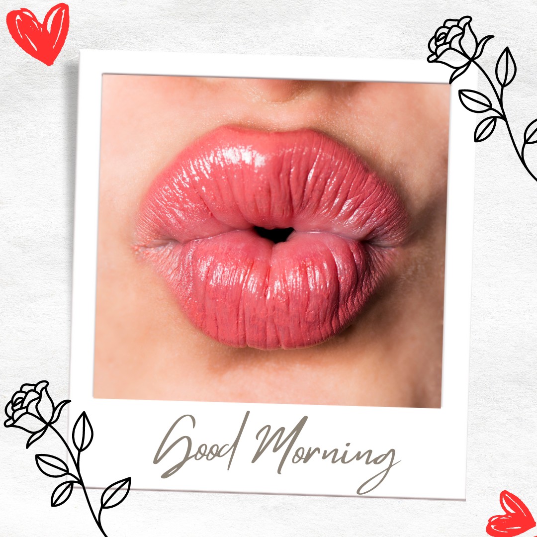 A close-up image of glossy lips blowing a kiss, framed in a polaroid style with the text "Good Morning" at the bottom. Red hearts and floral accents decorate the corners, making this image perfect for a romantic and affectionate morning greeting.