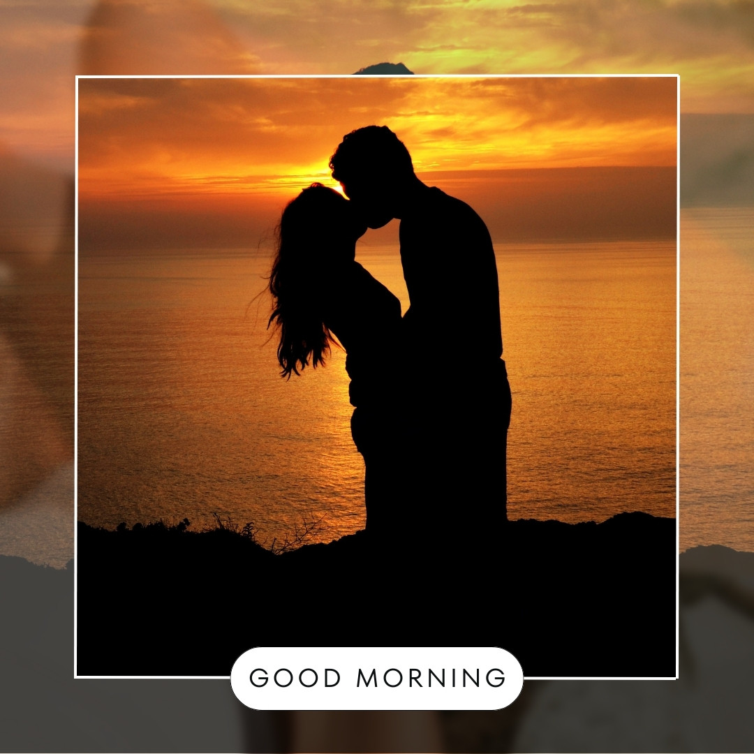 A romantic silhouette of a couple sharing a tender kiss against the backdrop of a stunning sunrise over the ocean, with the words "Good Morning" displayed at the bottom. Perfect for conveying love and warmth in the morning.