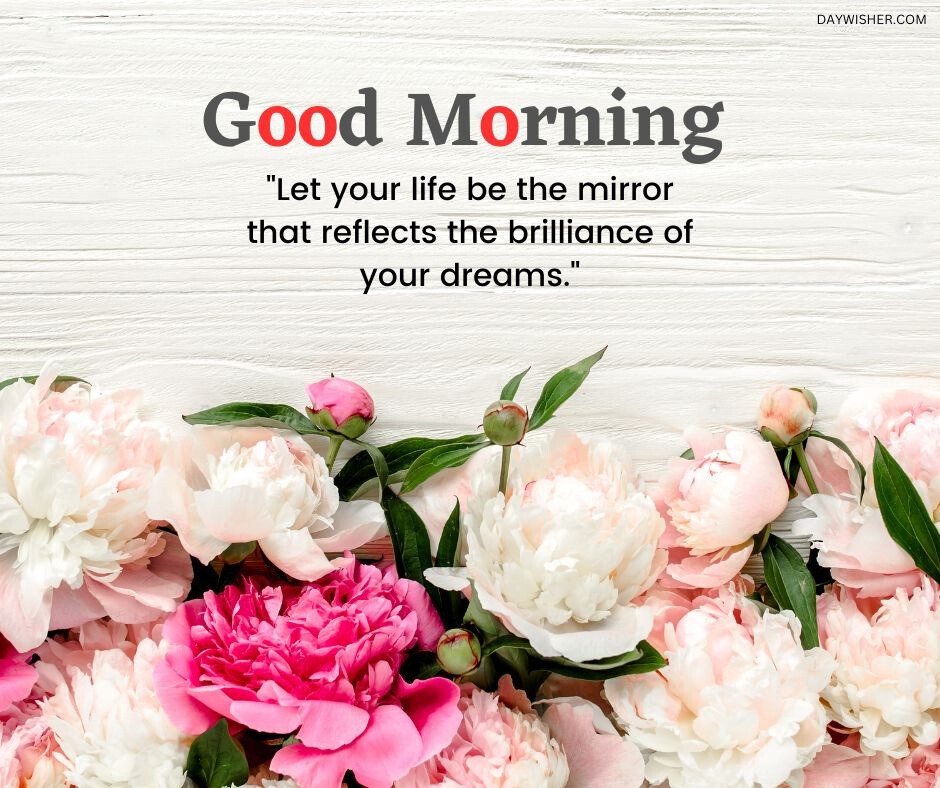 A lush arrangement of pink and white peonies on a textured white wooden background, paired with an inspiring good morning message about life and dreams, making this a perfect good morning flowers image to reflect and inspire.