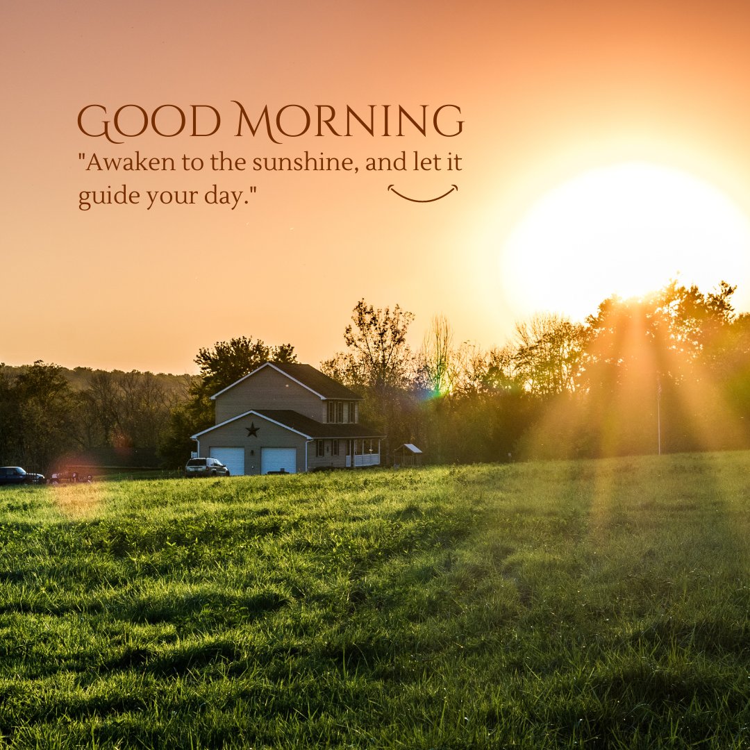 A beautiful sunrise over a peaceful countryside with a farmhouse in the background. The sun's rays illuminate the green field, creating a warm and inviting atmosphere. The text "Good Morning" is displayed above the quote "Awaken to the sunshine, and let it guide your day." This serene image captures the essence of a natural good morning sunshine, perfect for sharing positivity and inspiration.