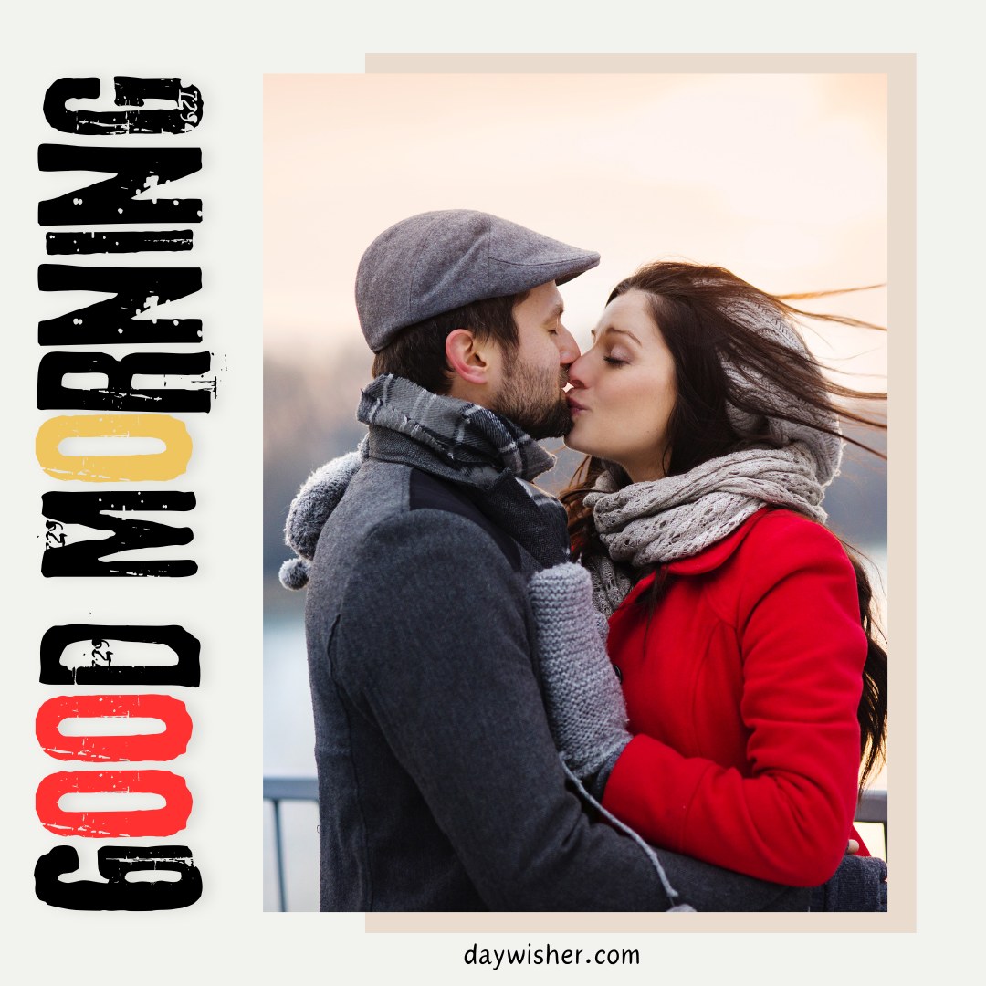 A couple sharing a kiss outdoors on a chilly morning. The man, wearing a gray coat, scarf, and cap, embraces the woman, who is wearing a red coat and gray scarf. The background features a soft focus of a winter landscape. The text "Good Morning" is written vertically in bold, distressed black, yellow, and red letters on the left side of the image.