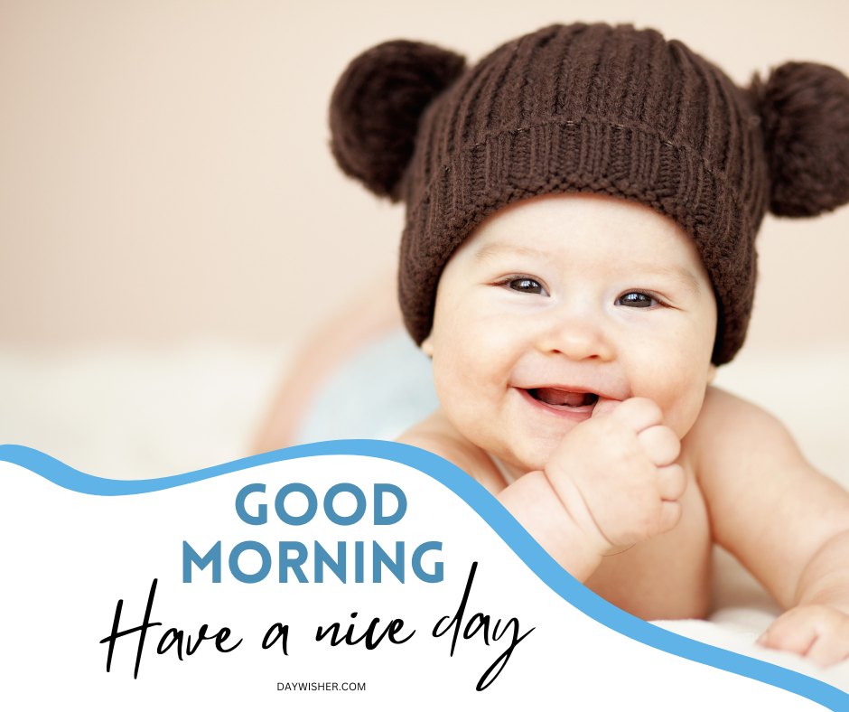 A cheerful baby wearing a brown knitted bear hat smiles while biting a finger, with text that says "GOOD MORNING Have a nice day" in a gentle blue and white font. This image of "Good Morning Baby" expresses cuteness overload.