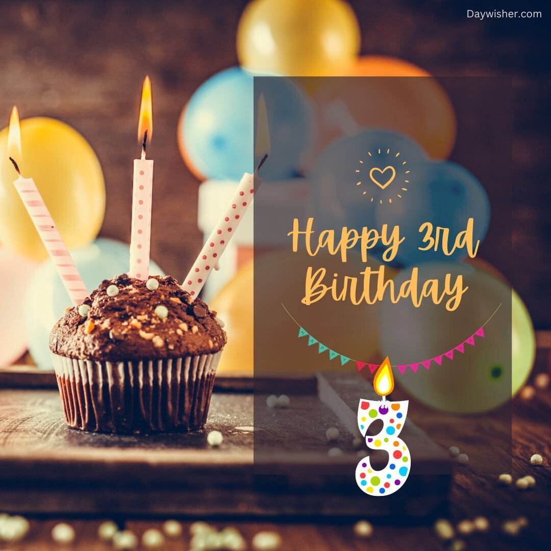 A festive birthday setup with a chocolate cupcake topped with lit candles, surrounded by colorful balloons and a "happy 3rd birthday" greeting, against a warm, wooden background. This image is perfect