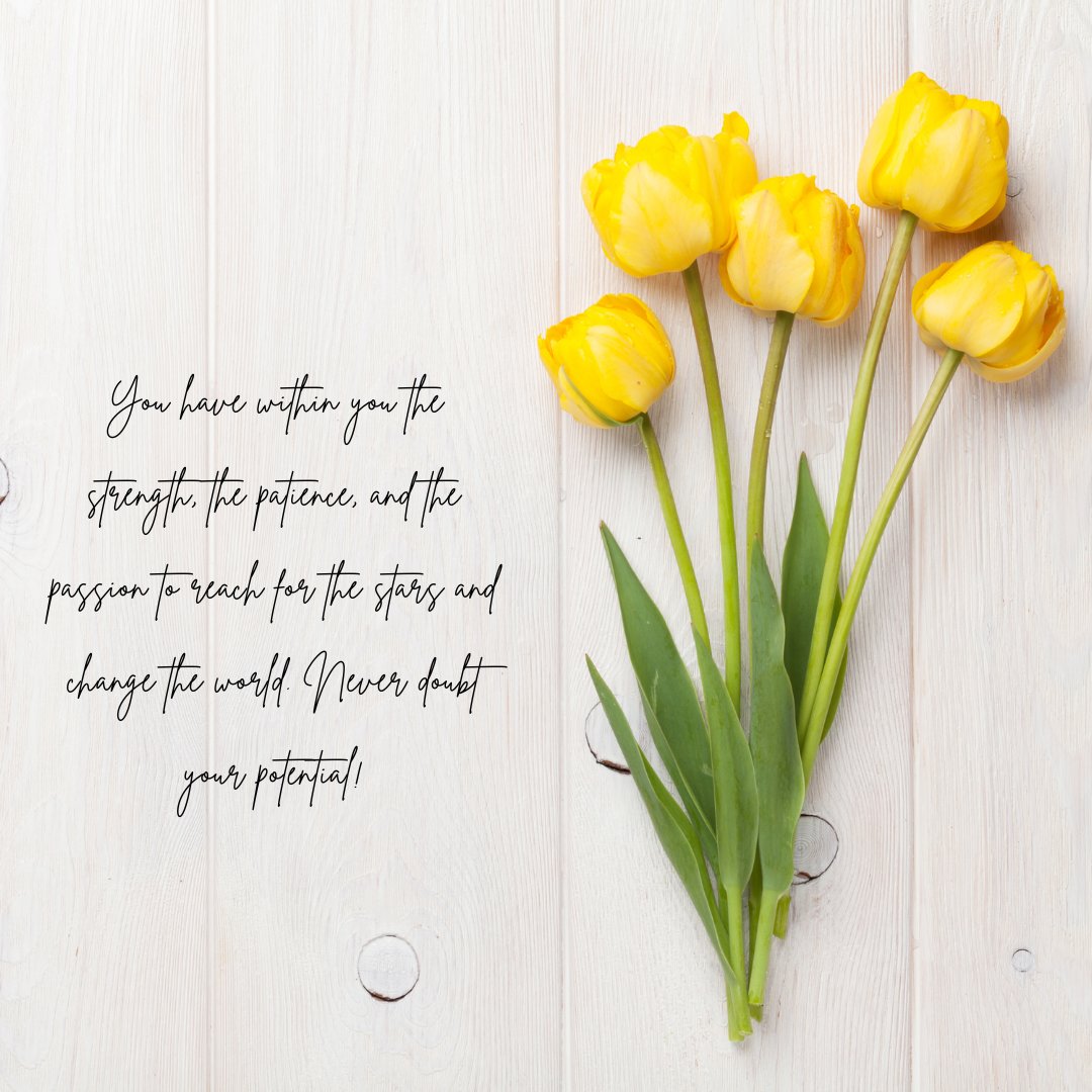 Vibrant yellow tulips laid on a wooden surface with an uplifting message about inner strength, patience, and passion to change the world, ideal for messages aimed at motivating a best friend.